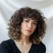 Short curly hair brunette