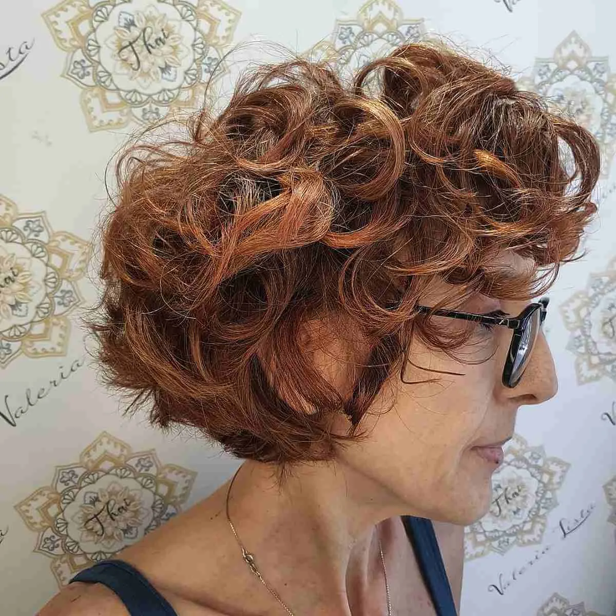 Charming Shorter Bob Cut with Luscious Curls and Fringe