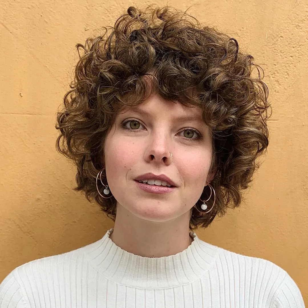 Charming Curly Bob with Bangs from the 50s Era