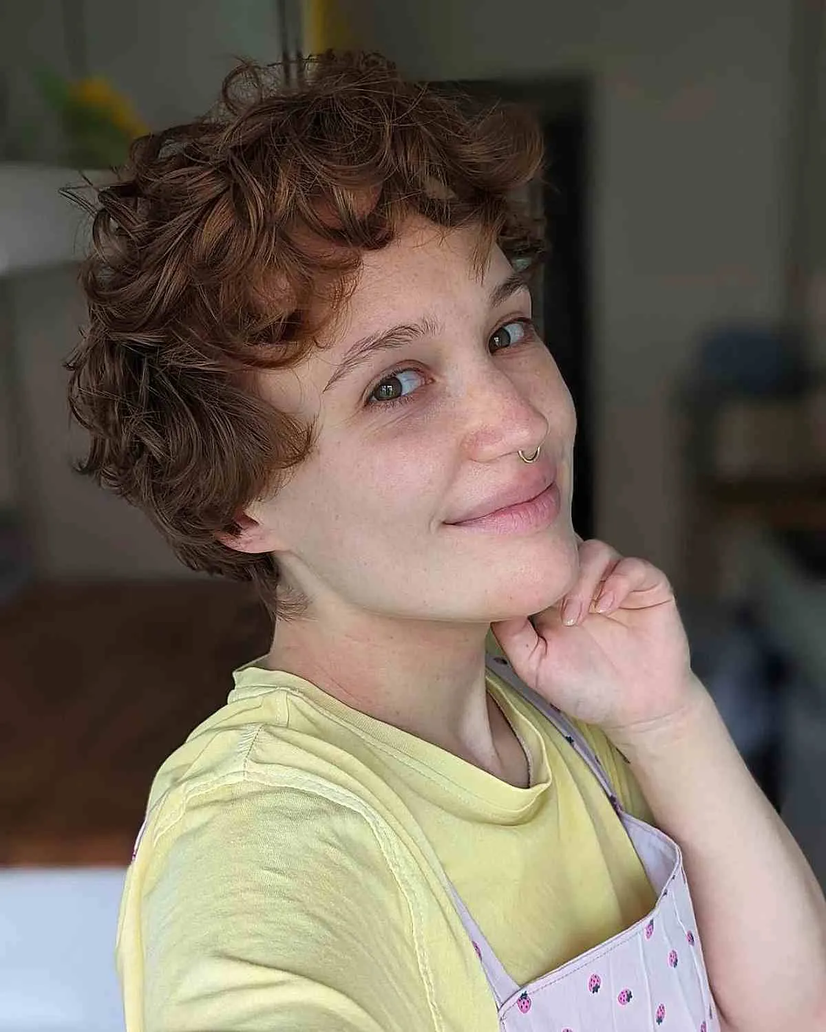 Chic Short Layered Cut for Curly Ginger Hair