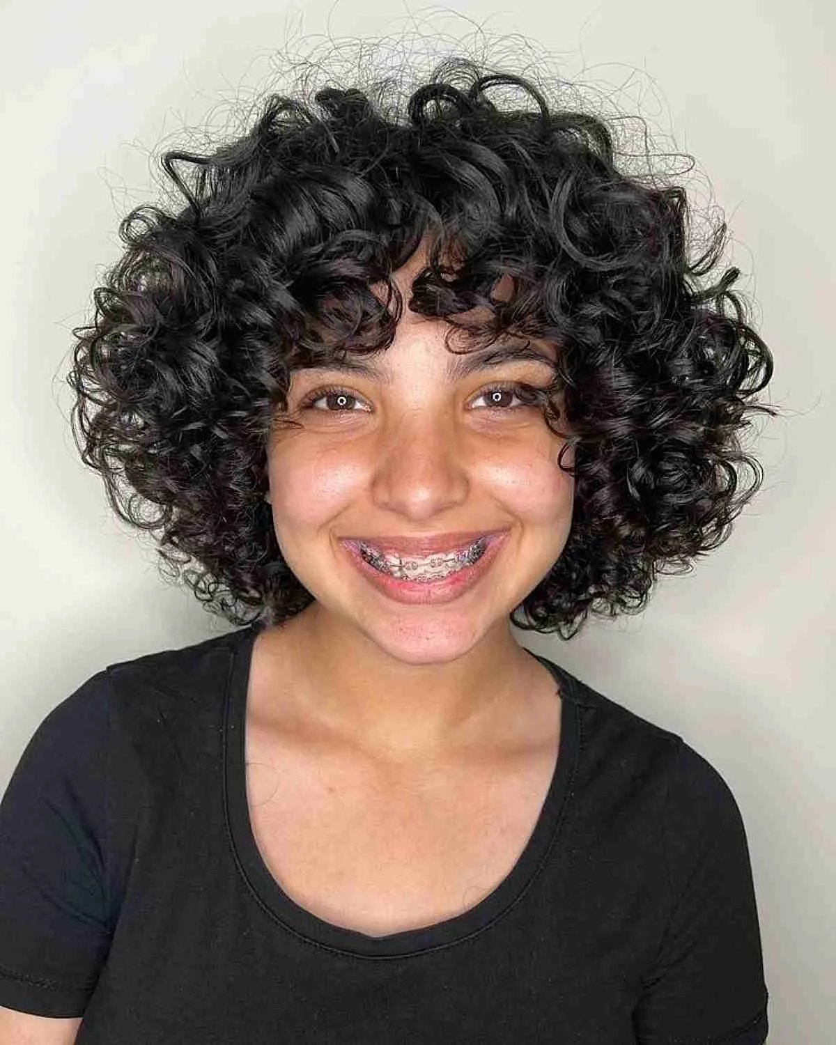 Curly Layered Bob with a Rounded Shape