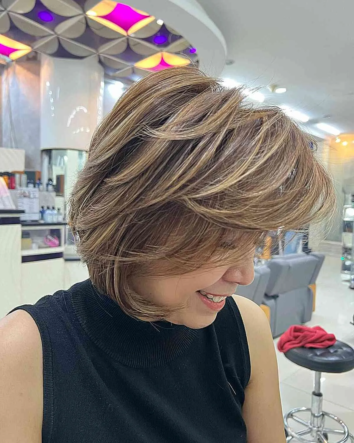 Light and Layered Bob with Side Bangs on Older Ladies