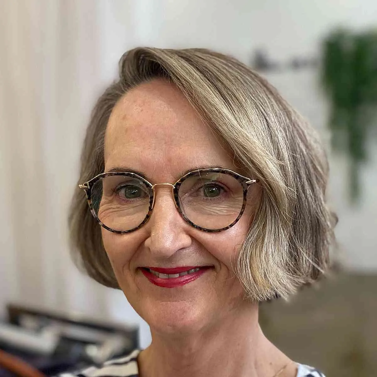 Stylish Grey Blended Short Bob with a Side Part for an Older Woman