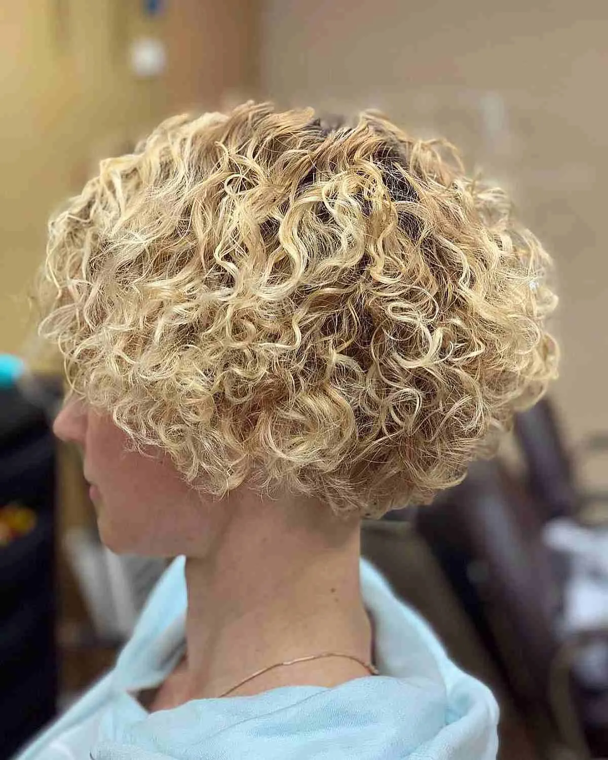 Short Inverted Bob for Rooted Blonde Curly hair